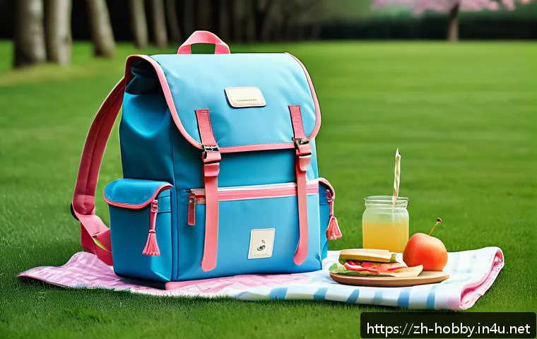 피크닉 가방 - A stylish spring picnic scene featuring a waterproof picnic bag made of durable PVC material with a ...