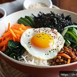 간단한 한식 요리 - A vibrant and colorful Korean bibimbap bowl featuring neatly sliced fresh vegetables like spinach, j...